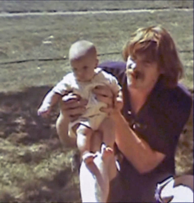 sarah dennis in front yard