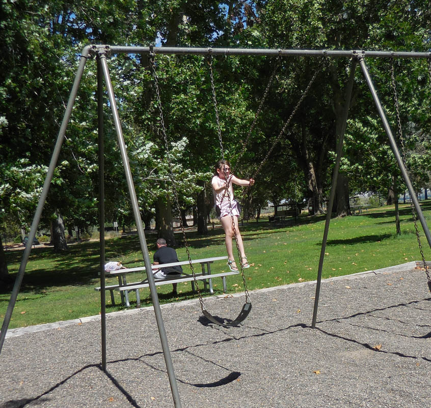 august_mandy swinging at sacajewea park